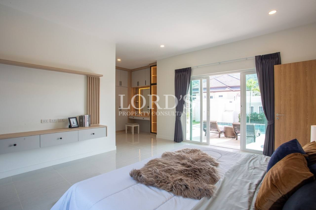 123 Bedroom with bed and natural lighting