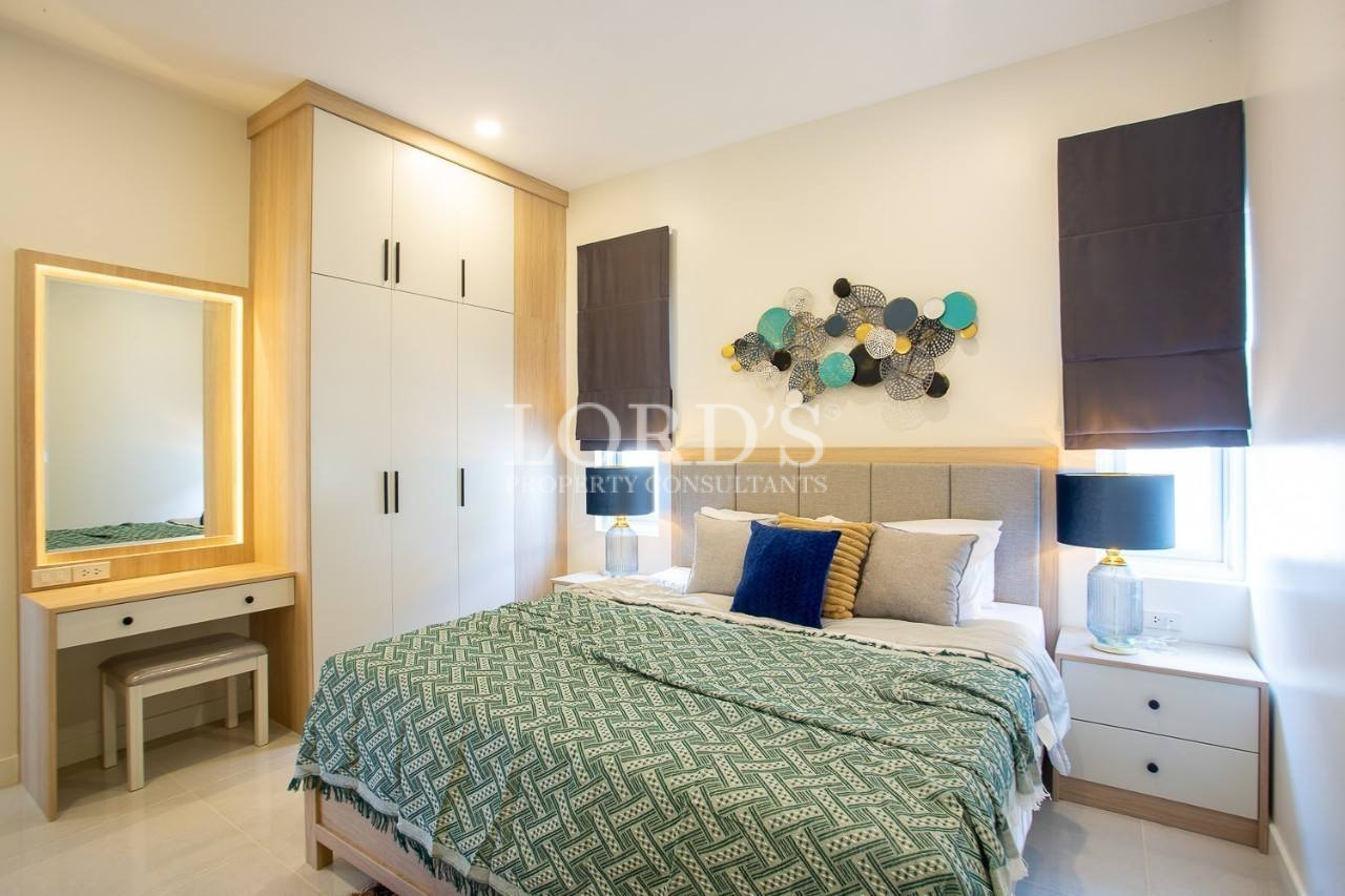 127 Bedroom with green bedding and decor