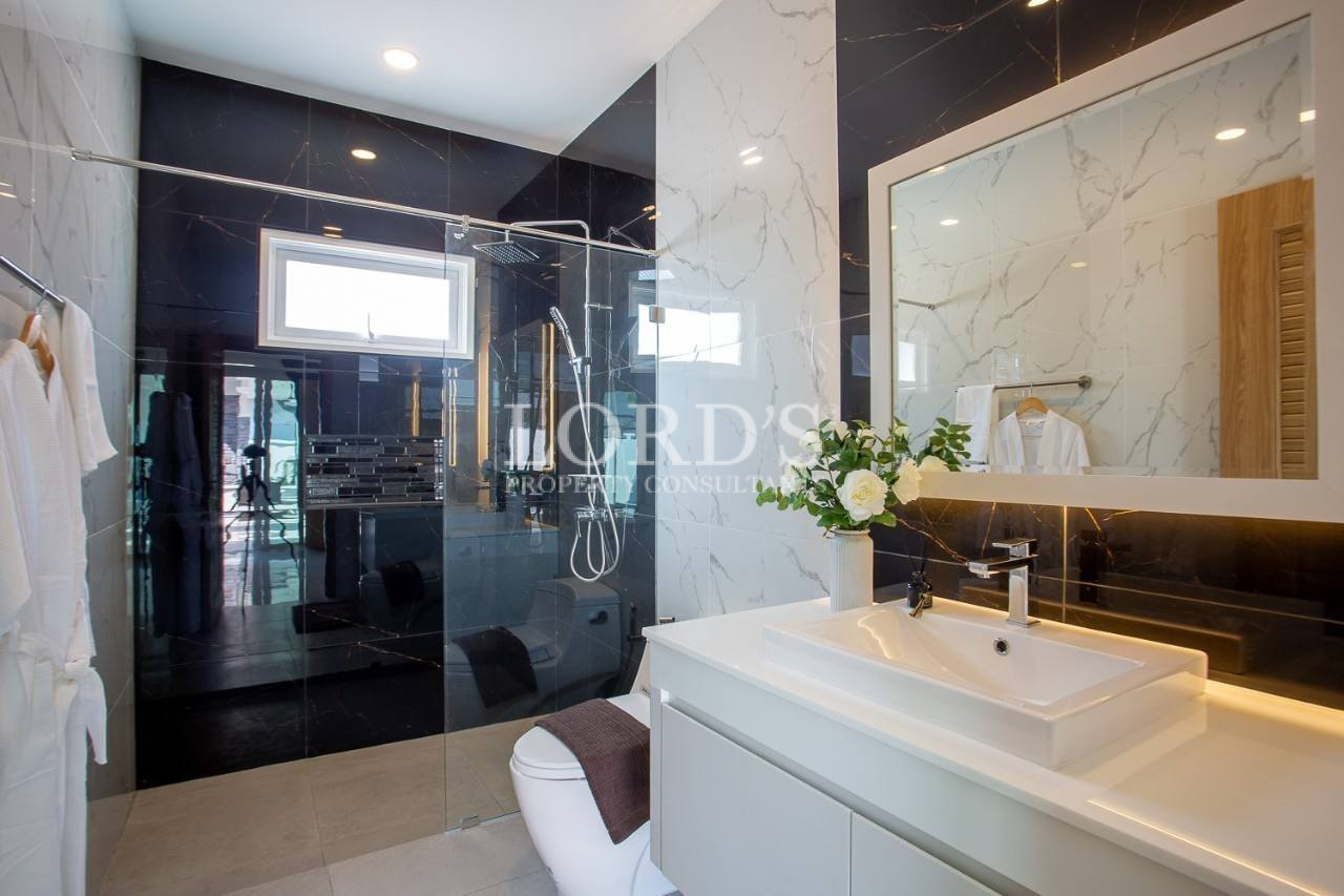 128 Bathroom with glass shower and vanity