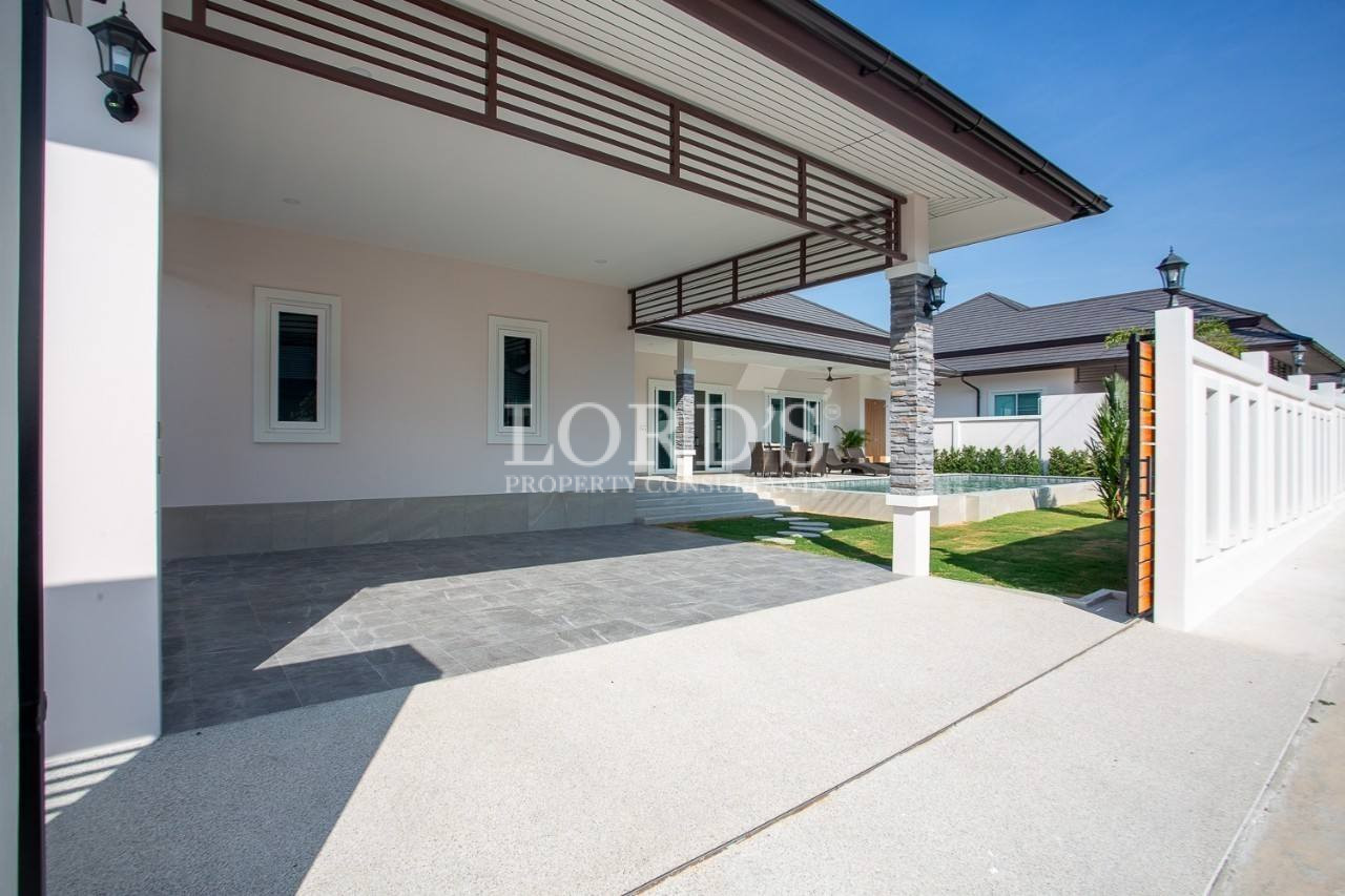 131 House exterior with covered parking area