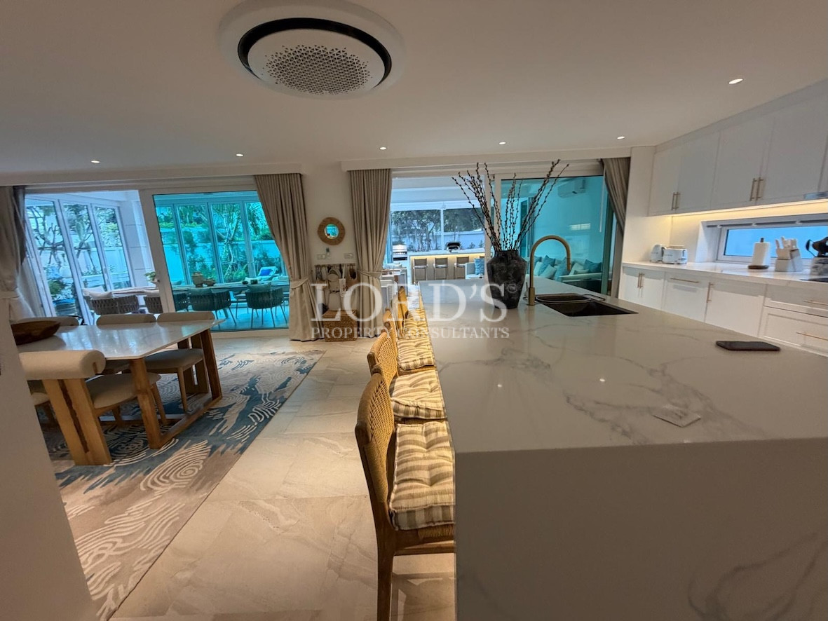 Kitchen island with countertop and lighting