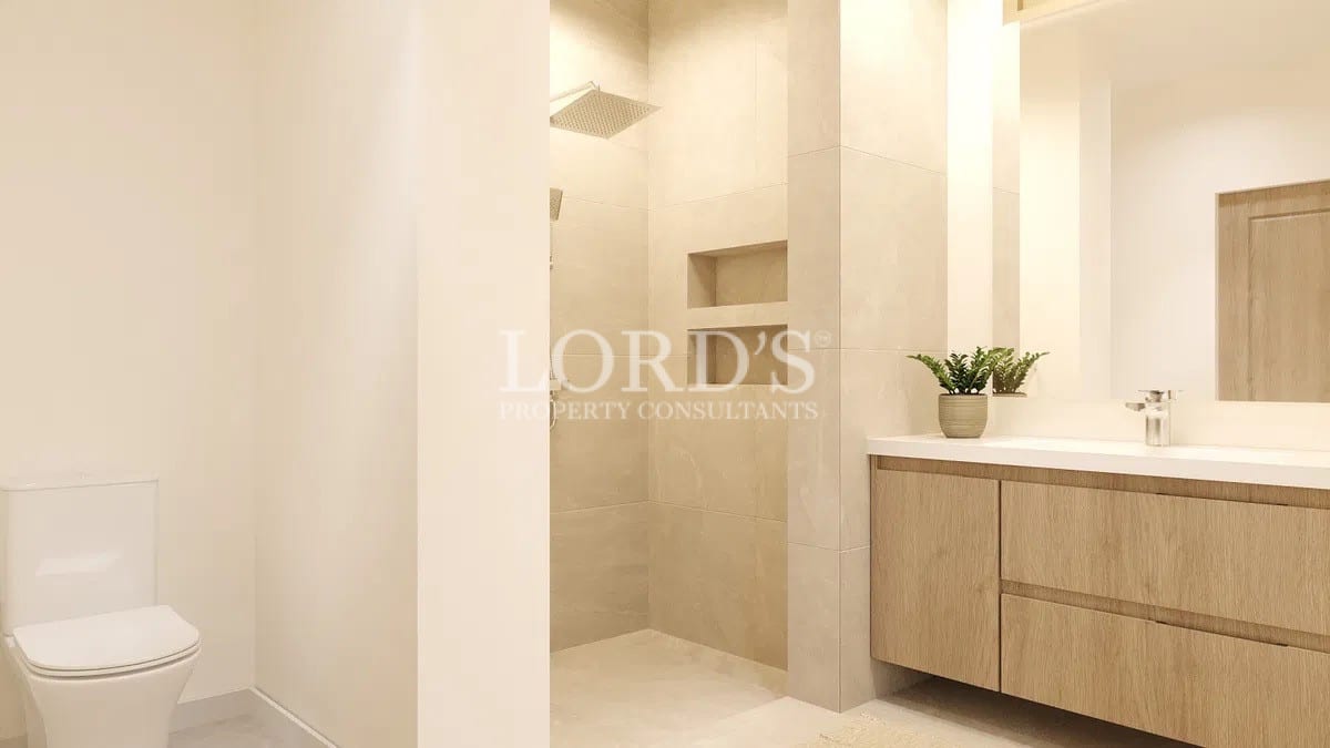 Bathroom with shower and vanity