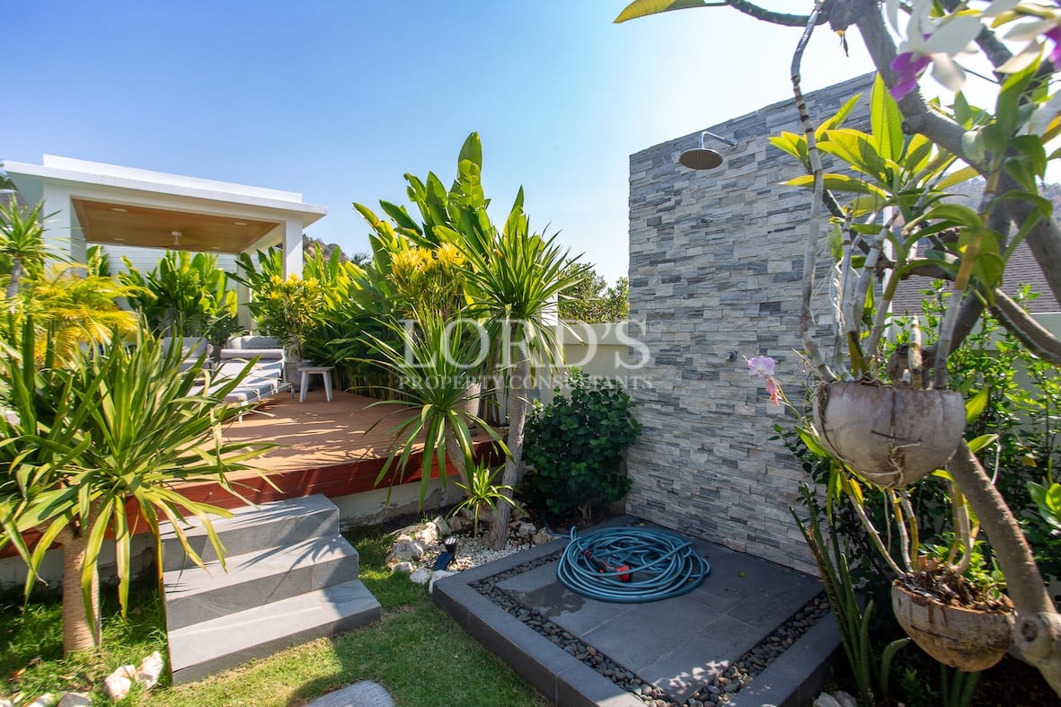 Modern house entrance with wall and gate