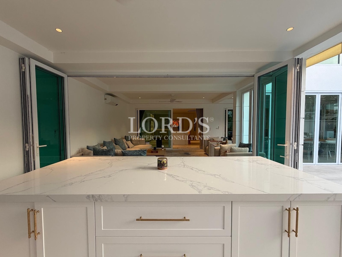 Kitchen counter with sink and storage