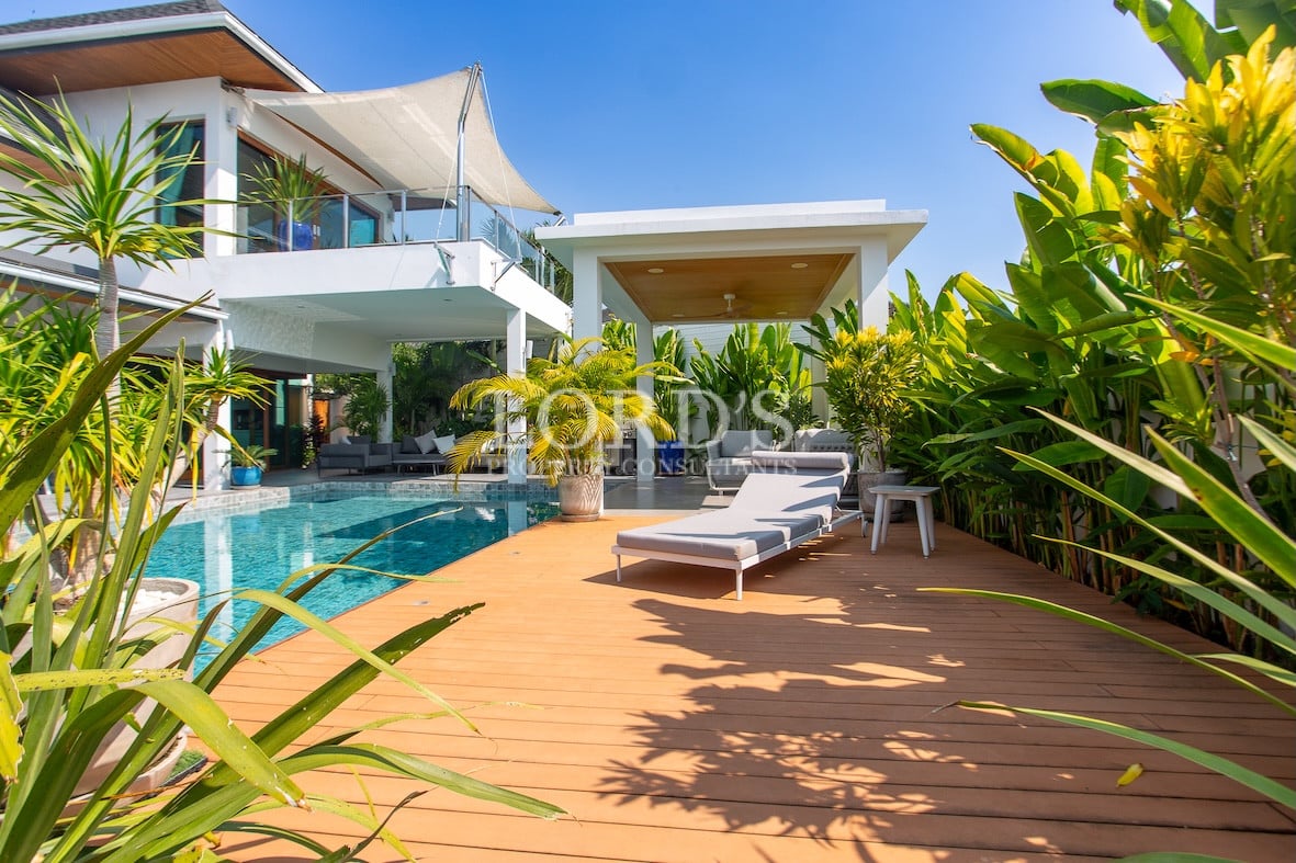 Covered parking area with modern gate