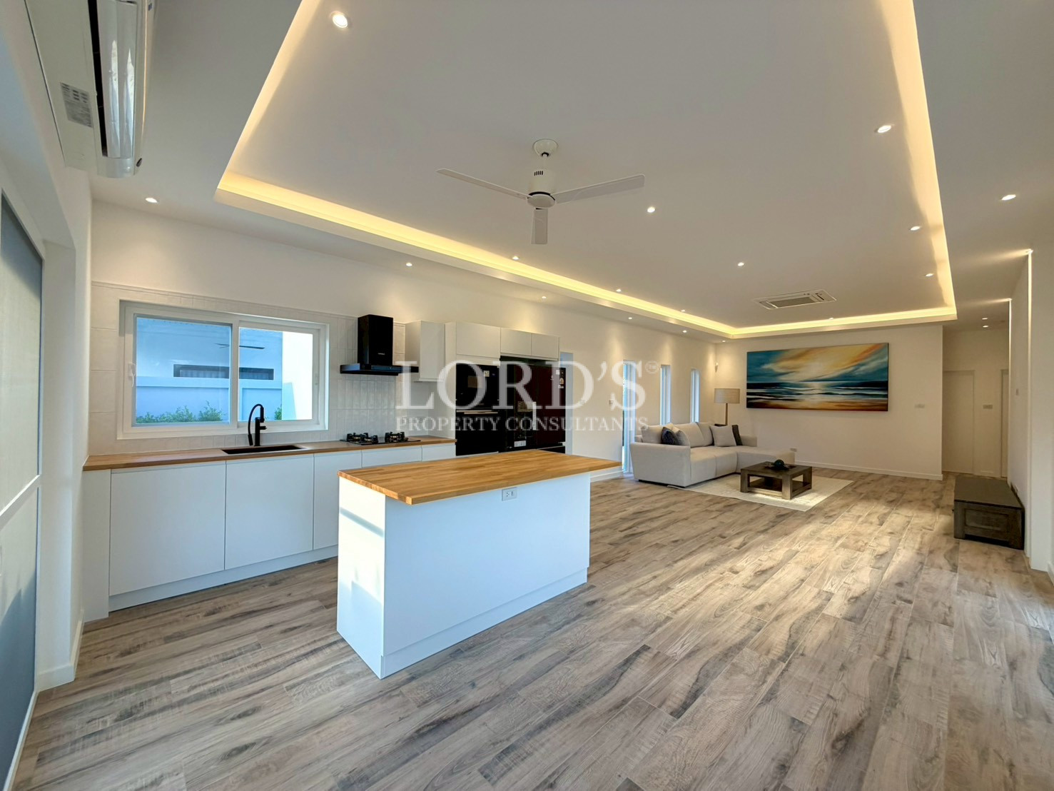 Beautiful spacious bedroom with large windows