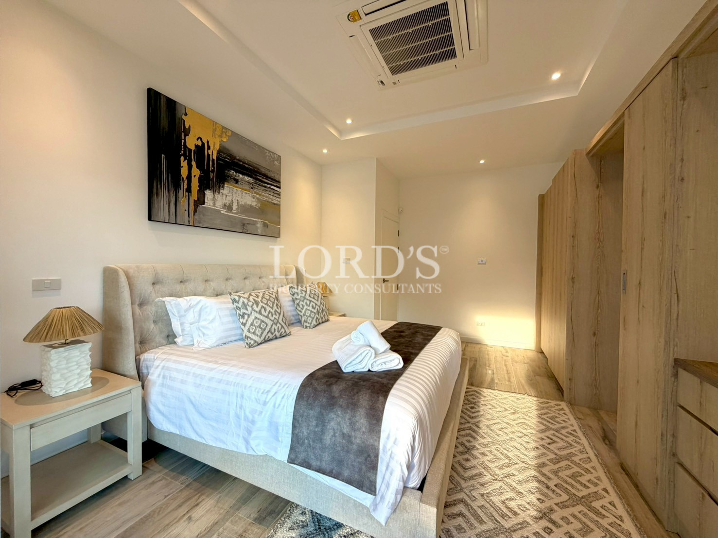 Beautiful bedroom with built-in cabinets