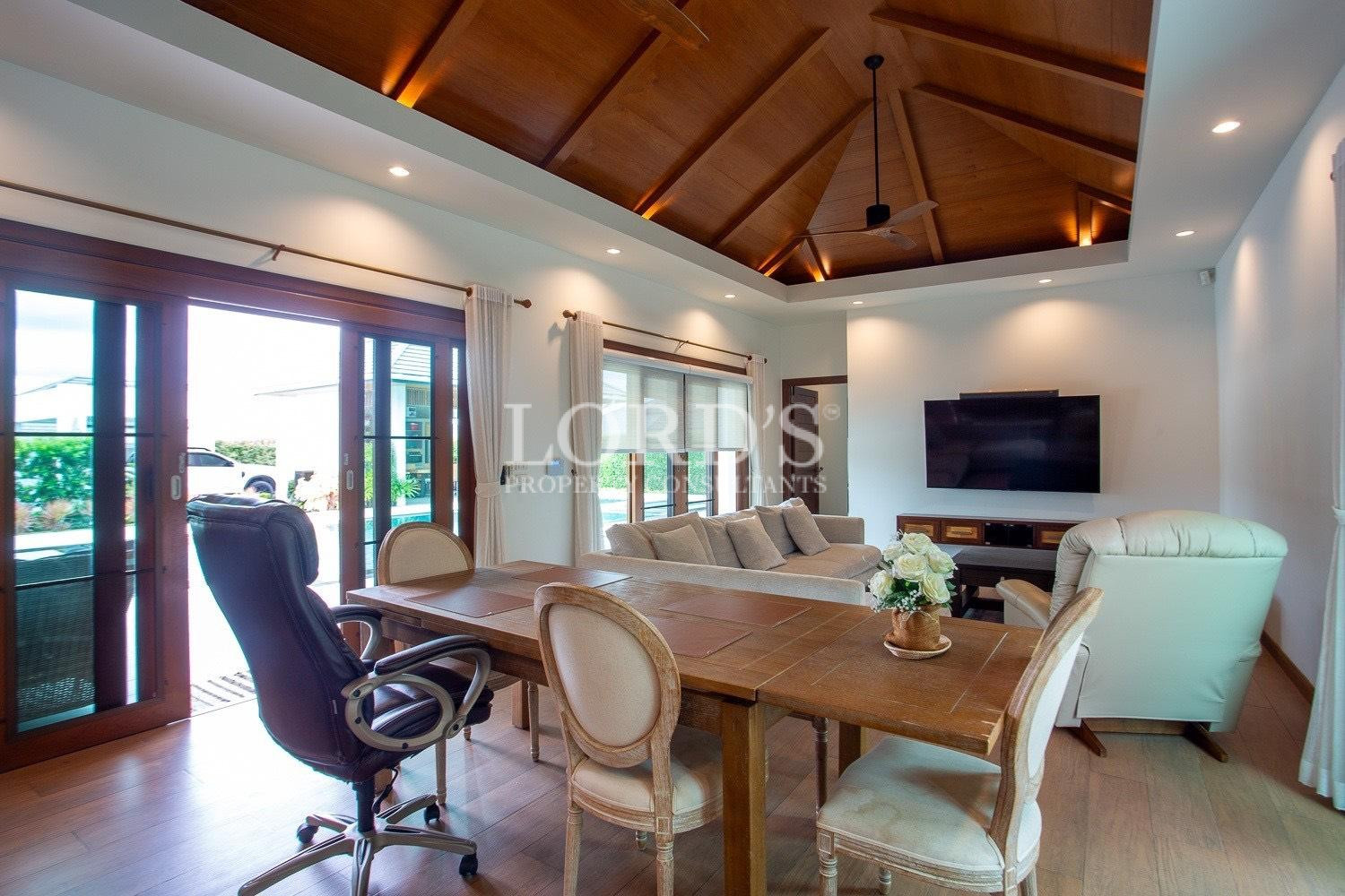 Dining area under wooden ceiling