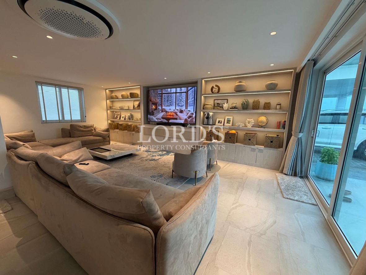 Living room with corner sofa and decor