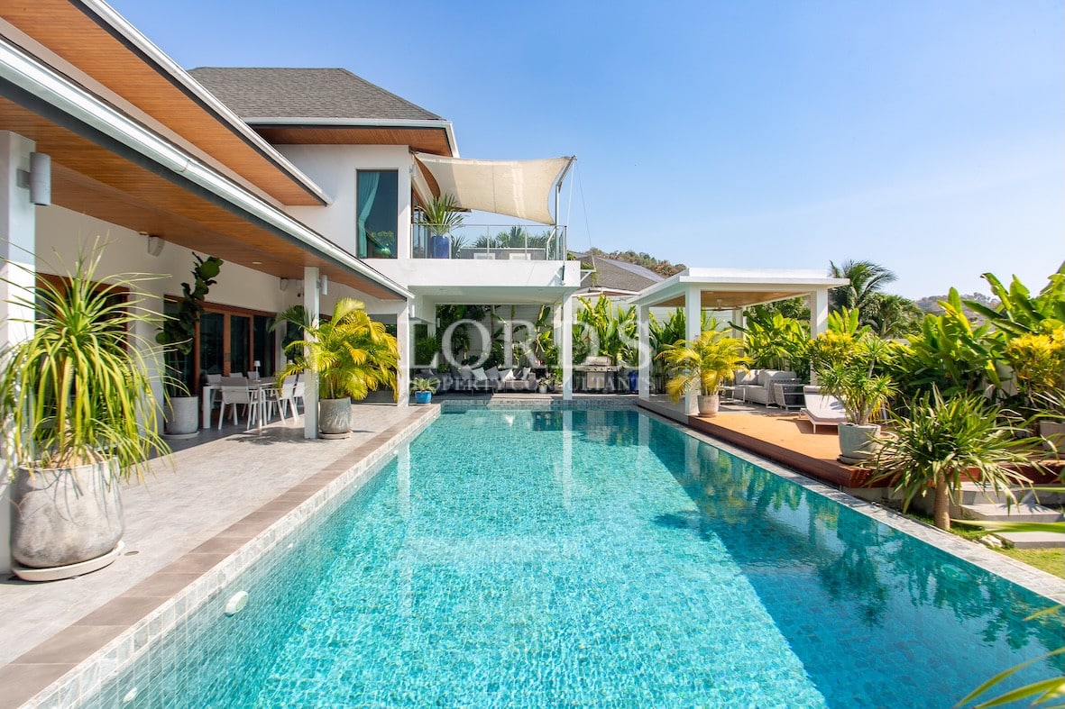 Poolside area with garden and patio