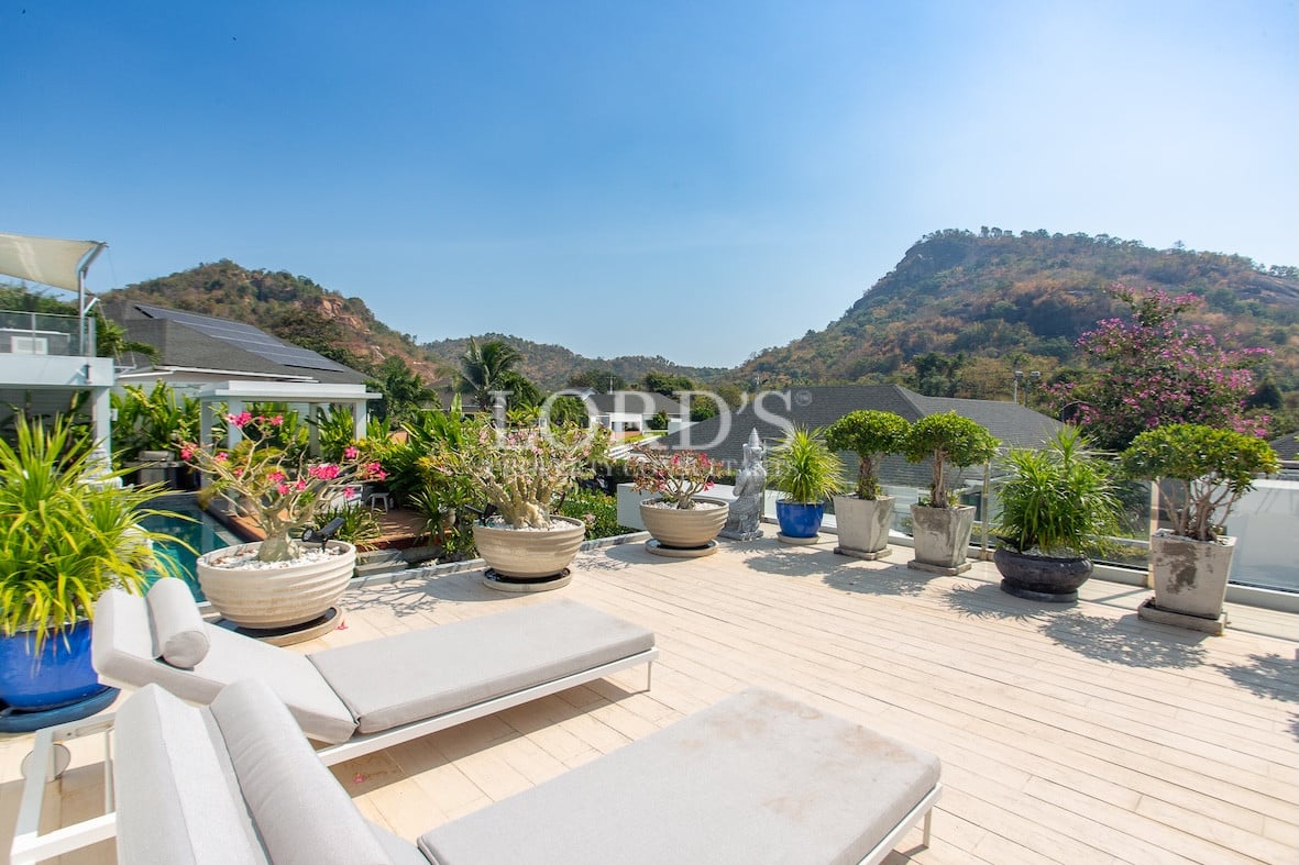 Swimming pool with modern villa