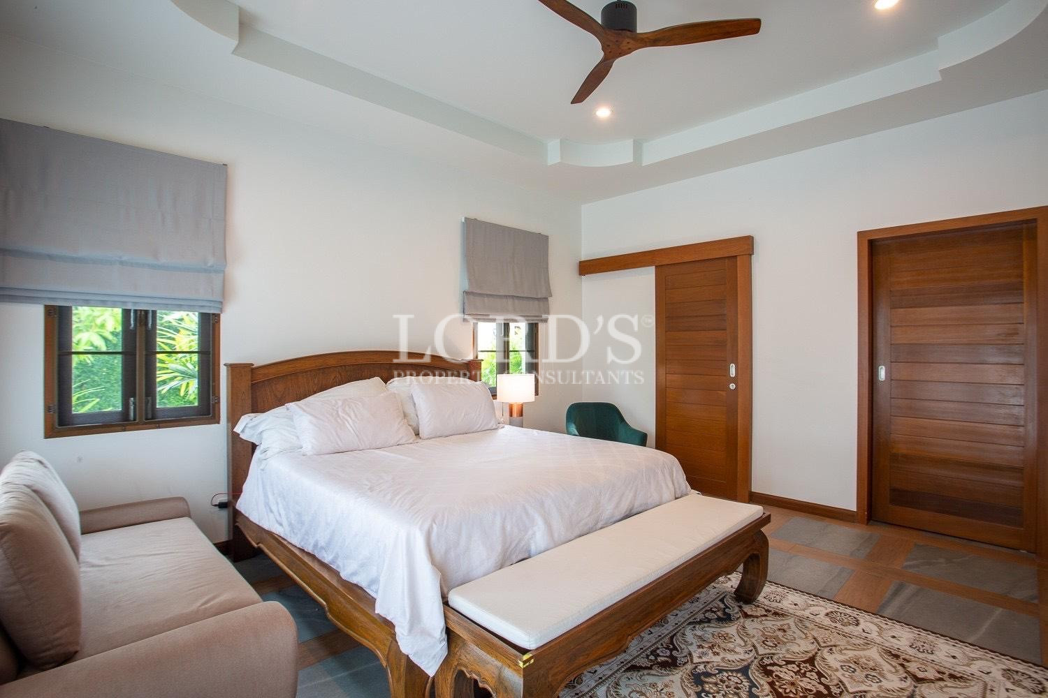 Bedroom with wooden furniture