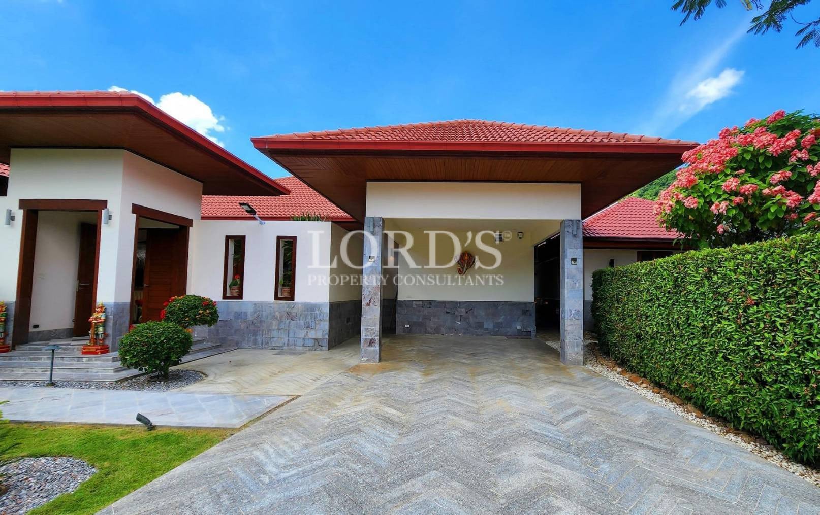 House exterior with driveway and garage