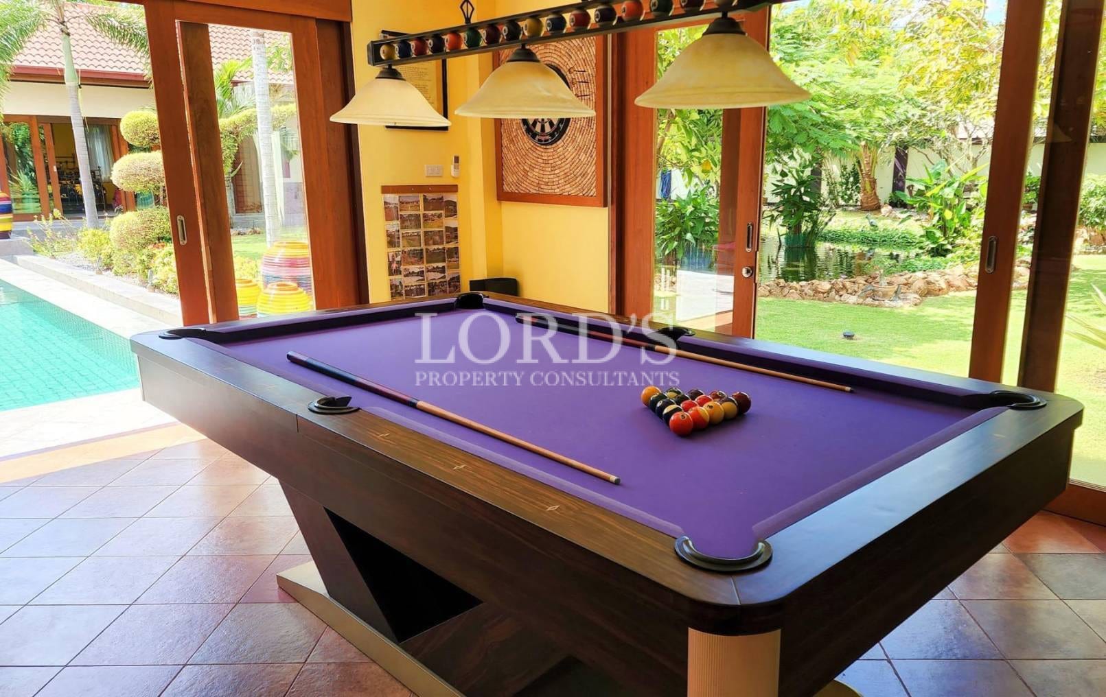 Game room with billiards table