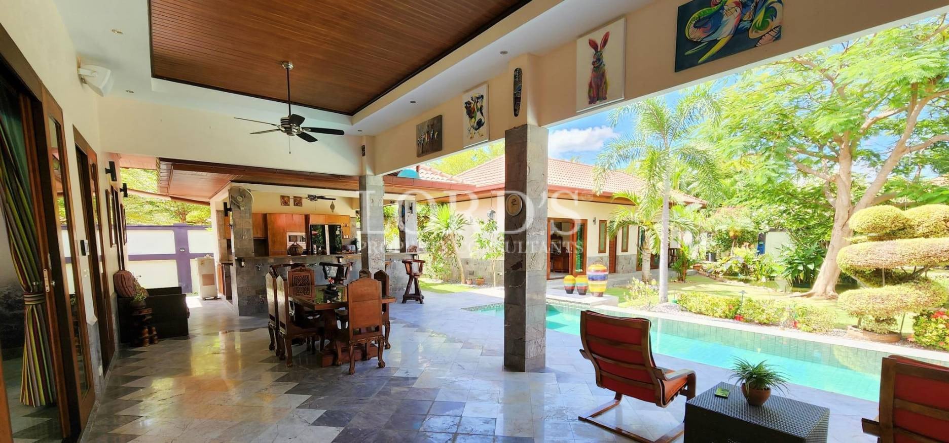 Pool with tropical garden and clear water