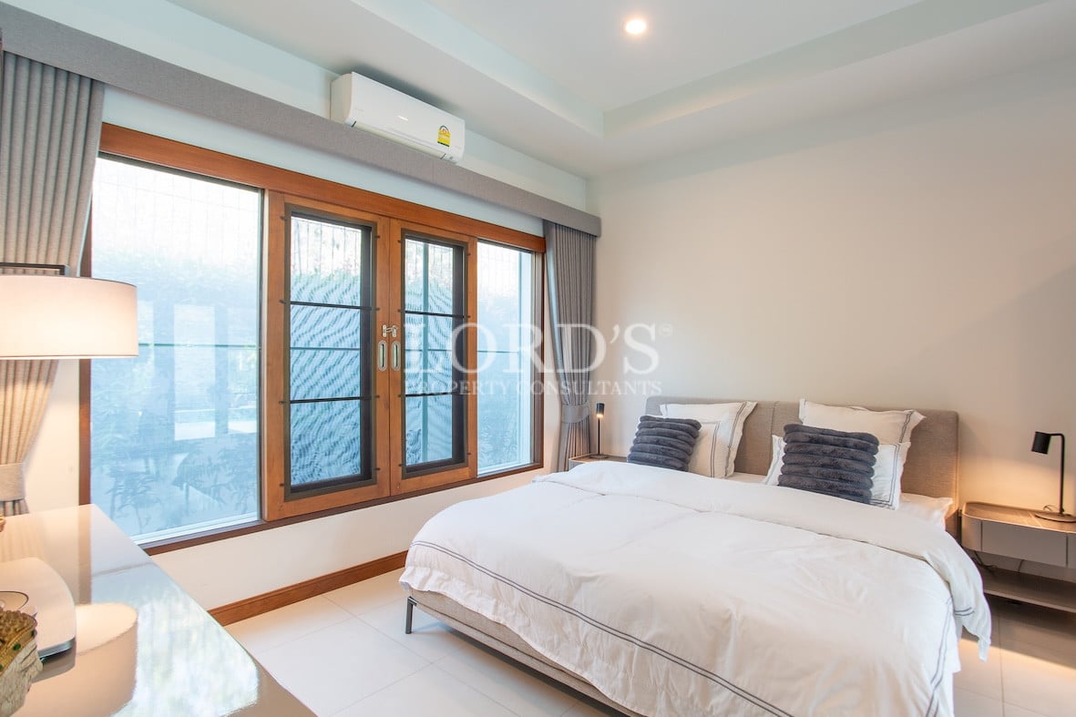 Bedroom with large windows and natural light