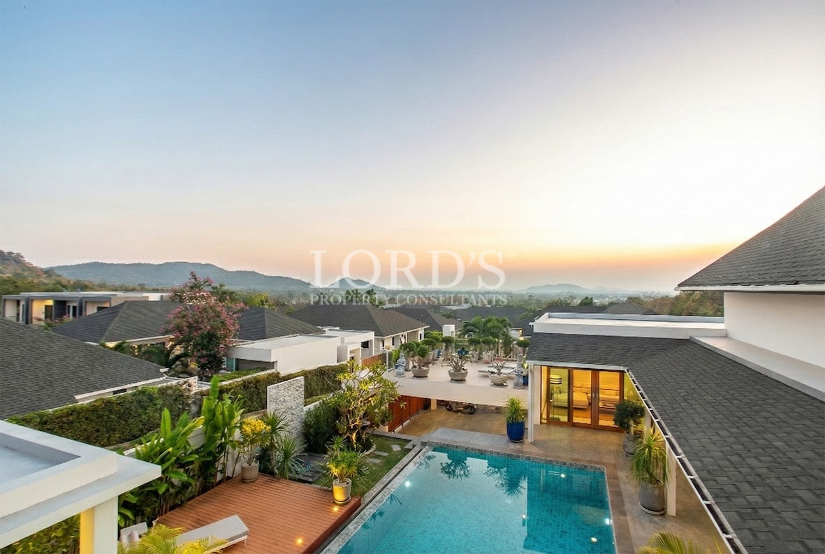 Aerial sunset view of villas and landscape