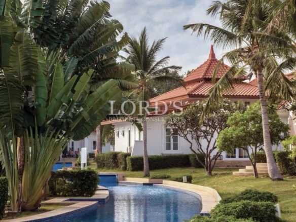 Luxury villa with pool and palm trees