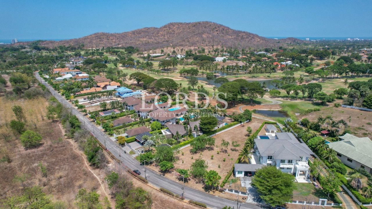 Aerial residential community with hills
