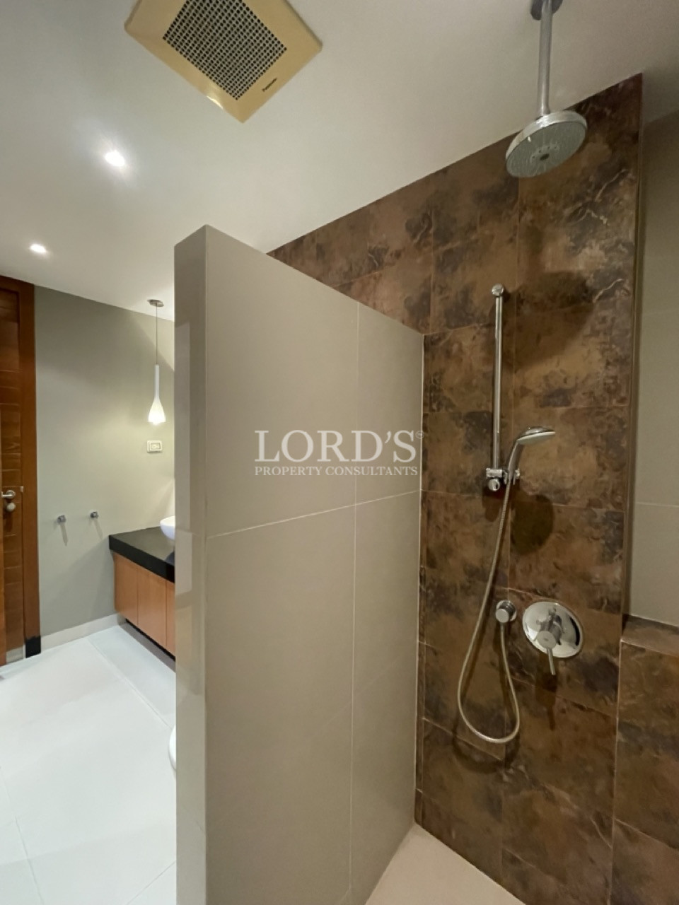 Bathroom with shower and glass partition