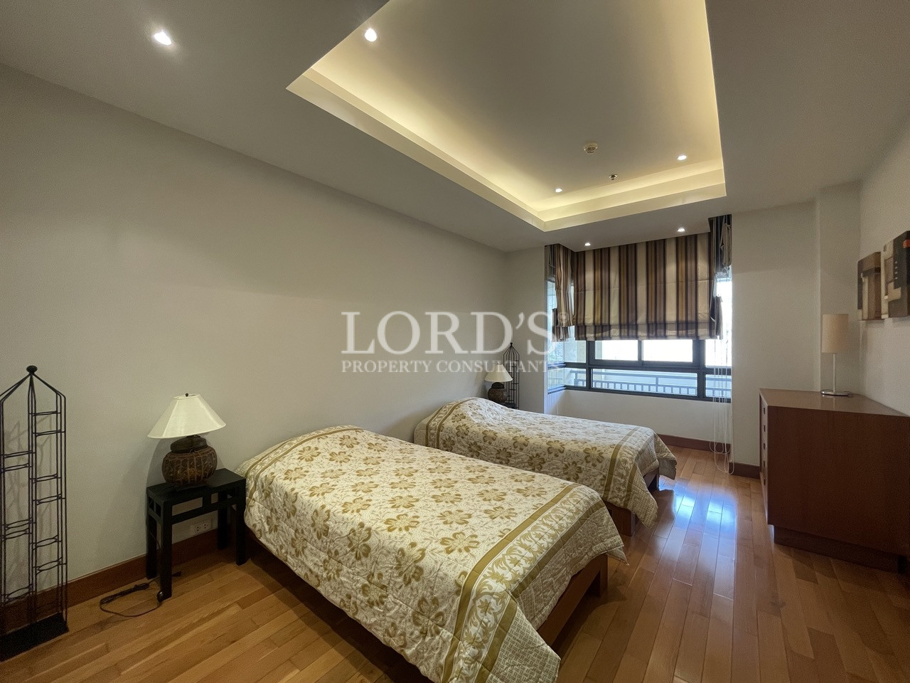 Bedroom with bed and soft lighting