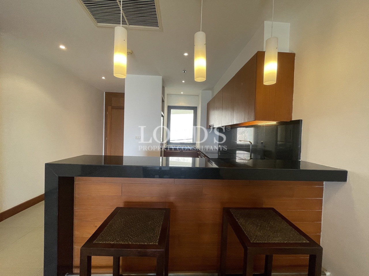 Dining area with pendant lighting and table