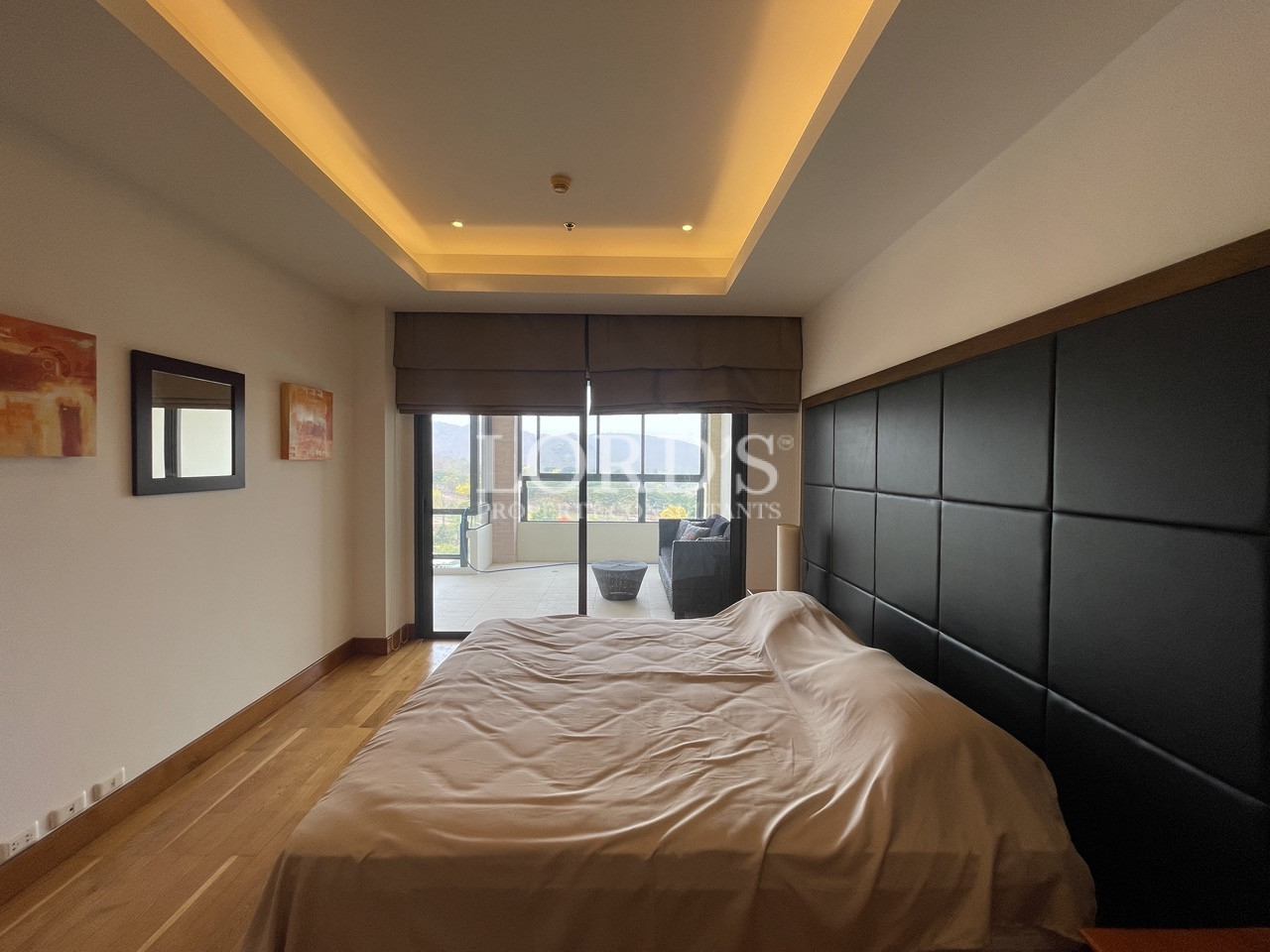 Bedroom with wooden accents and modern design