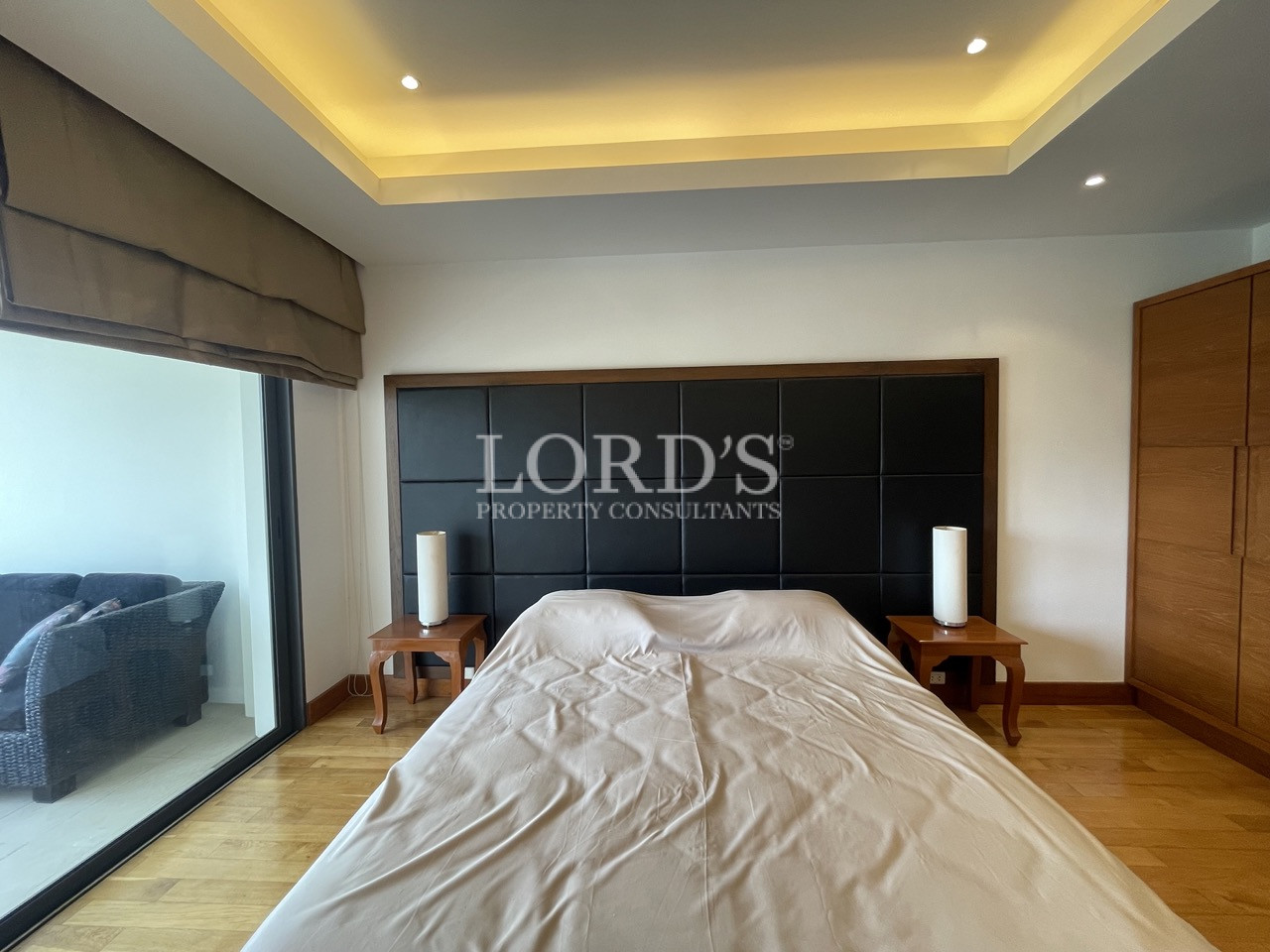 Bedroom with modern ceiling lighting and bed