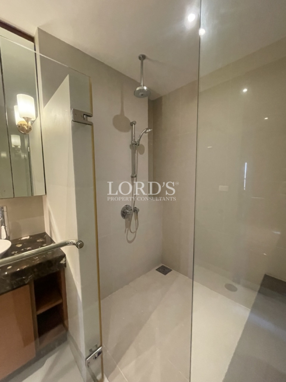 Bathroom with glass shower and vanity