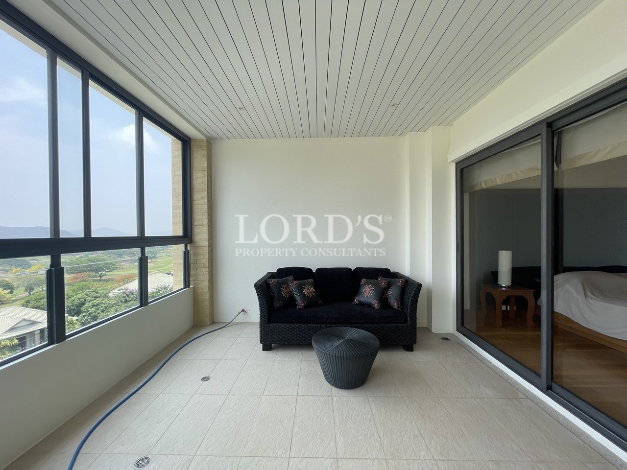 Empty room with large window view