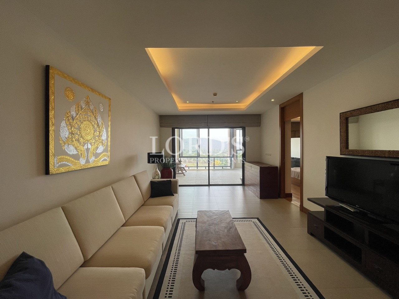 Living room with sofa and warm lighting