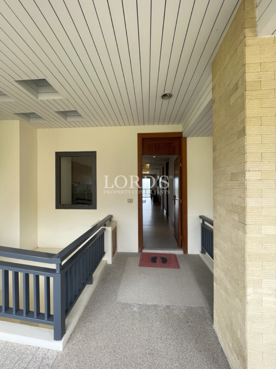 Covered porch with railing