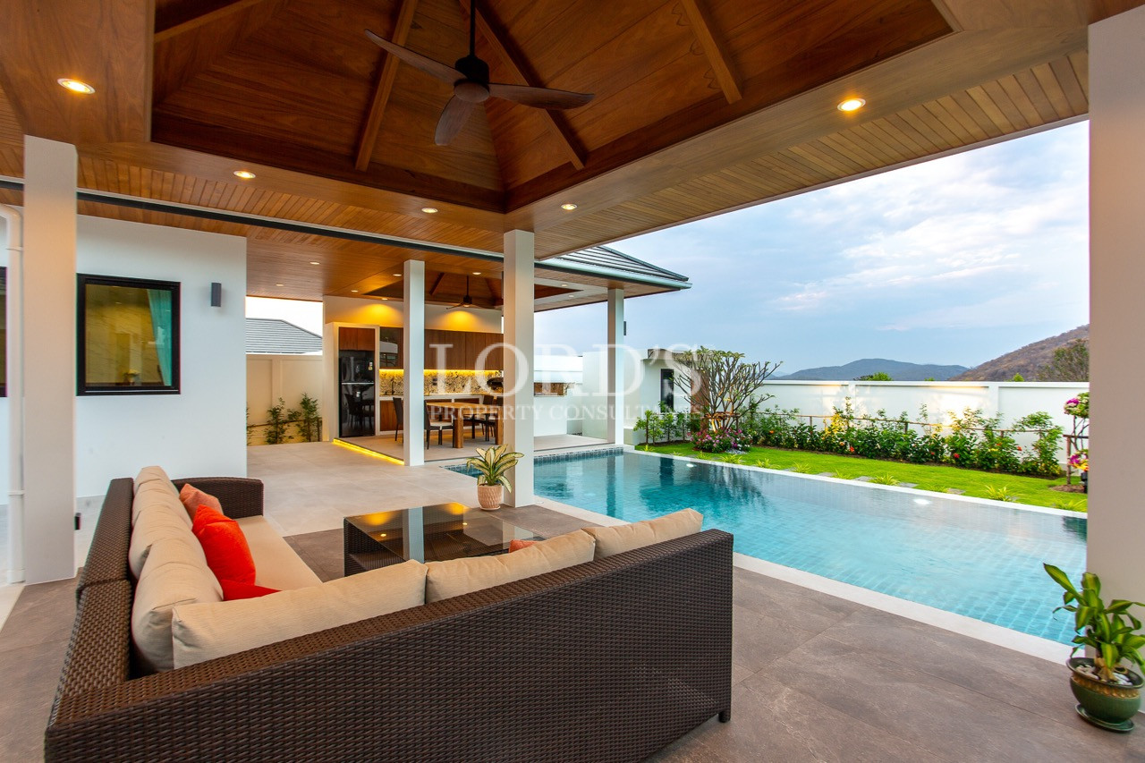 outdoor lounge with pool view