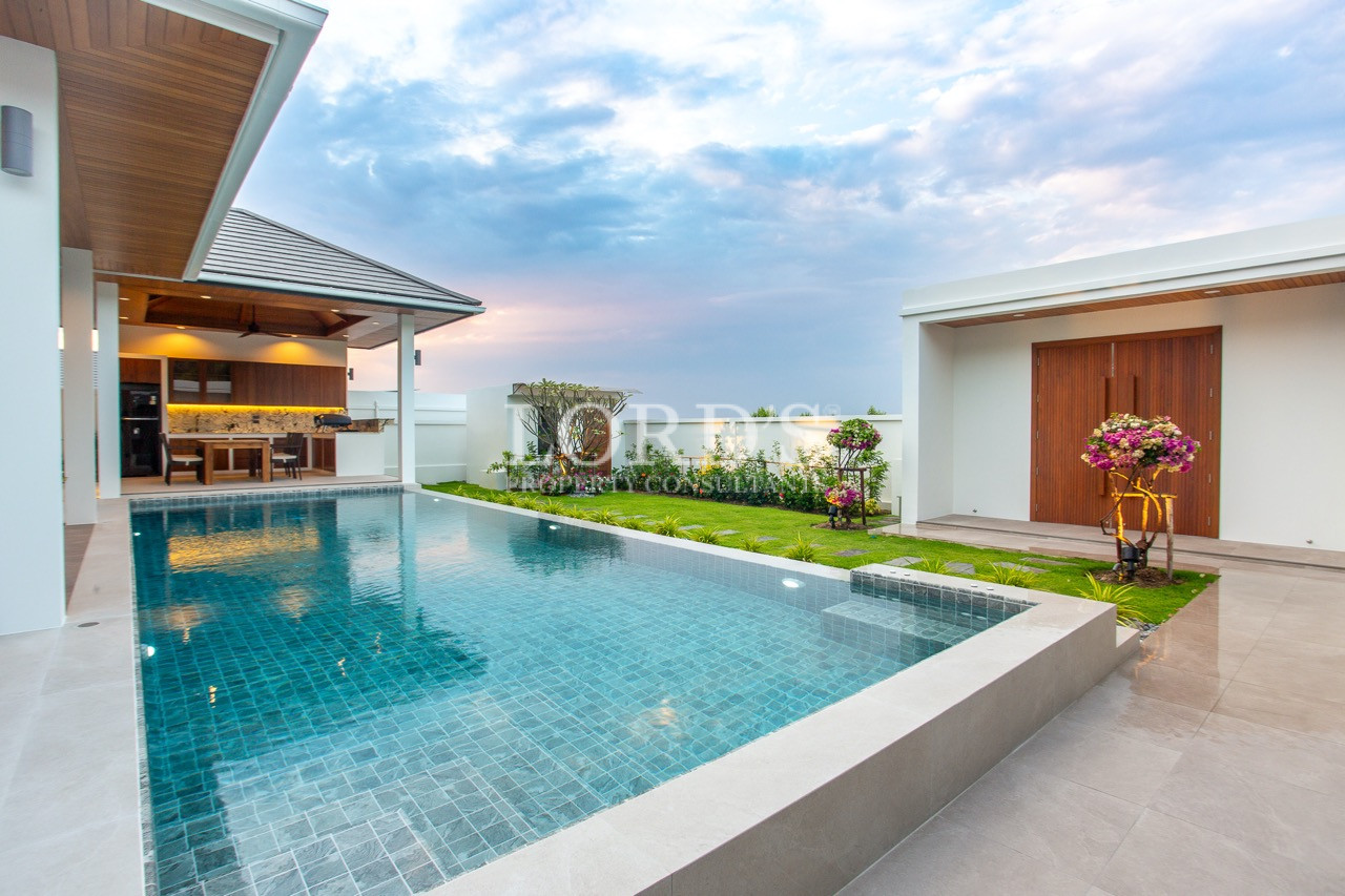swimming pool with modern house