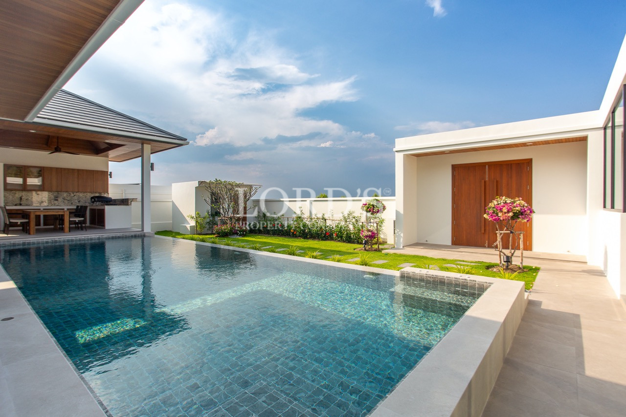 modern villa with pool and garden