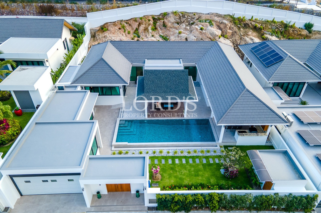 modern villa with garden and pool