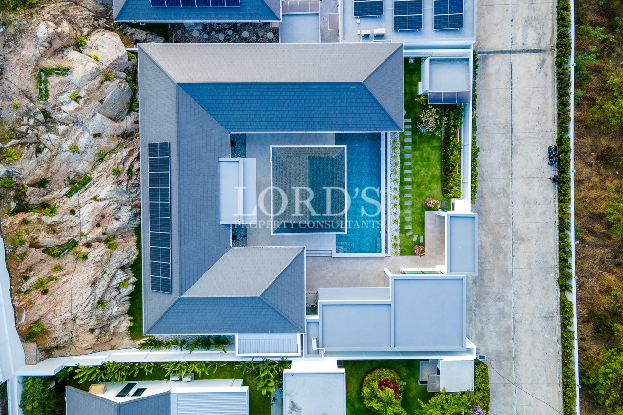 aerial view luxury villa with pool