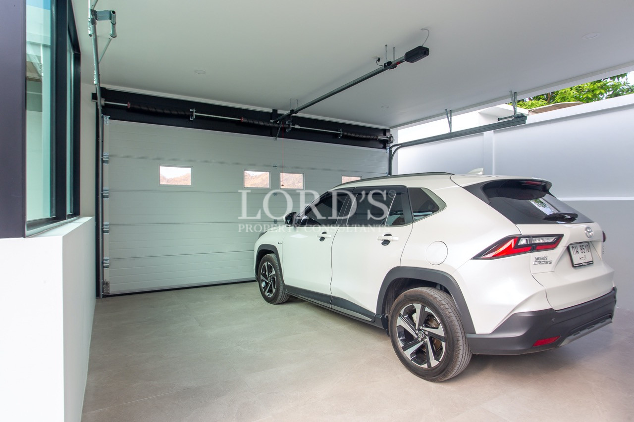 garage interior with parked car