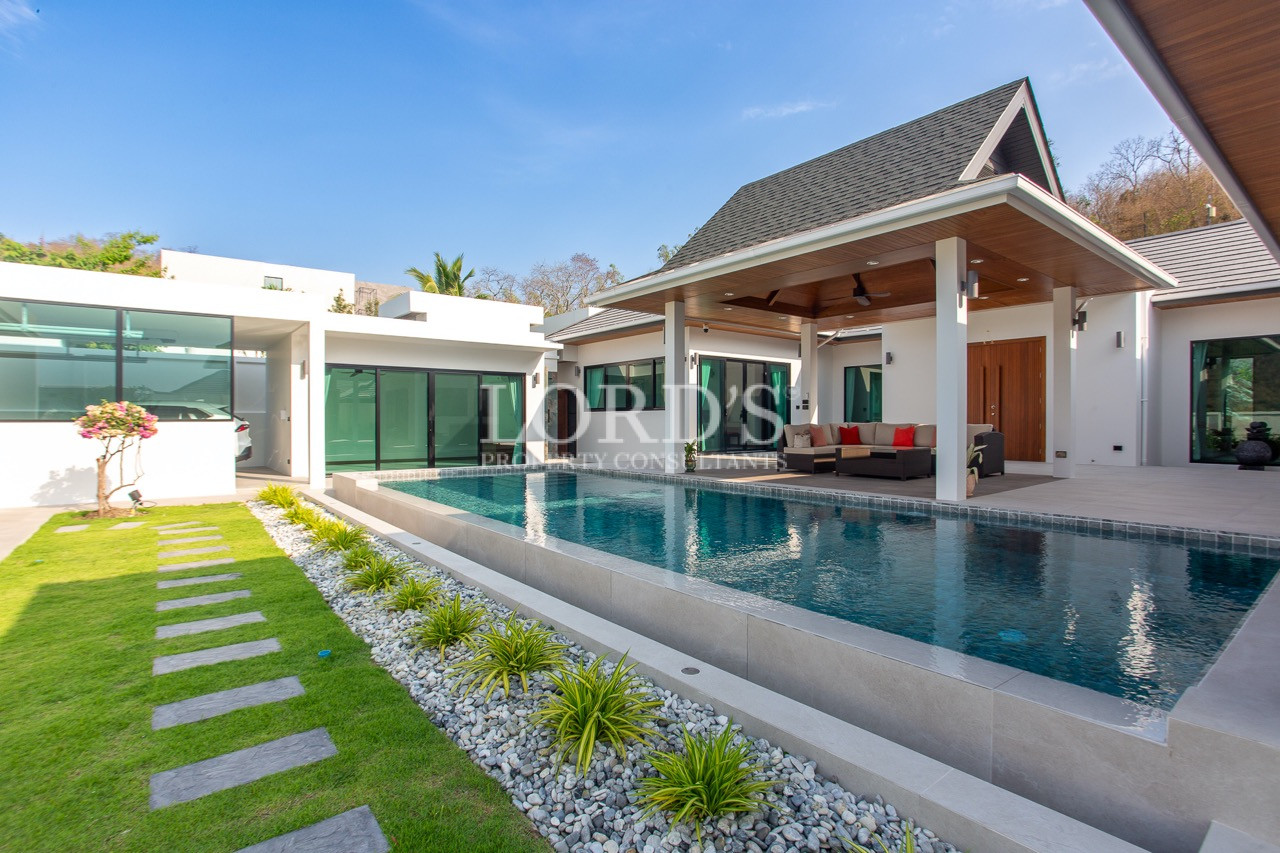 villa with long swimming pool view
