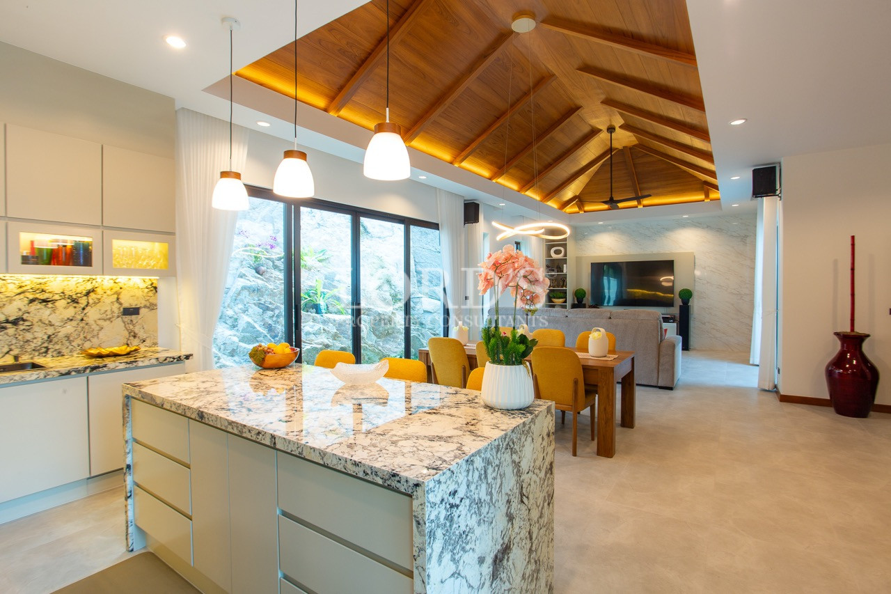 kitchen with island and lighting