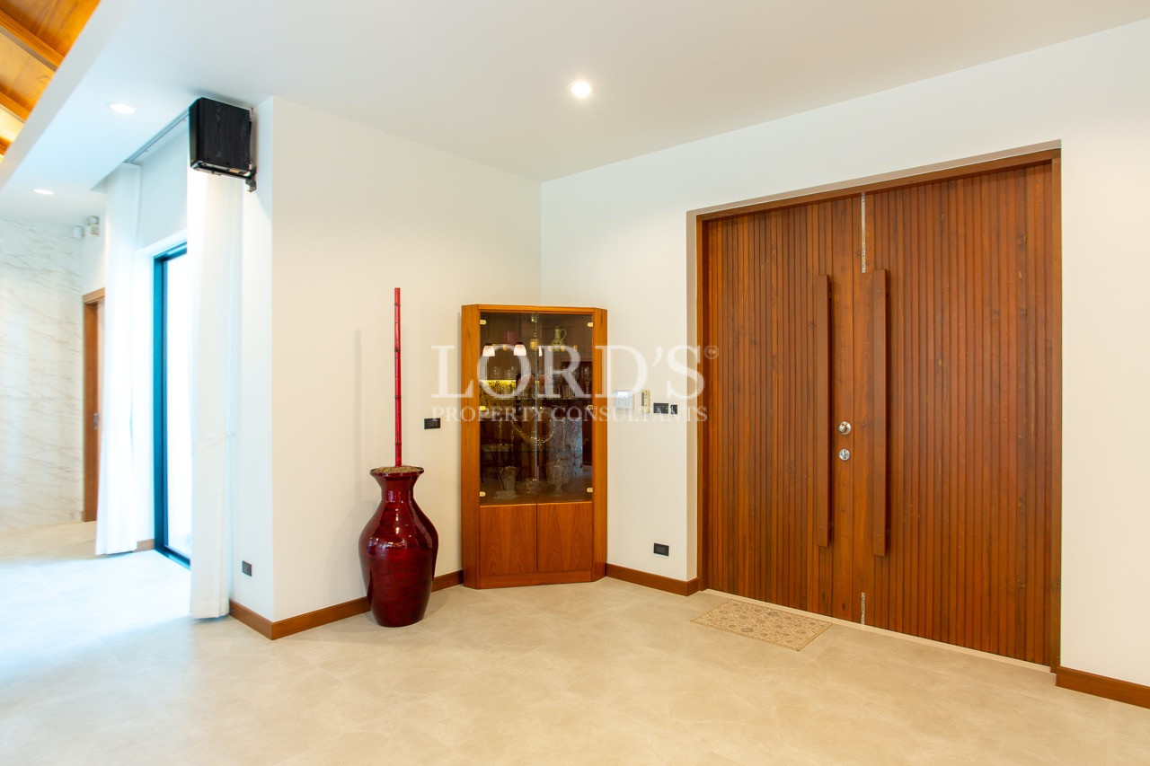 house entrance with wooden door