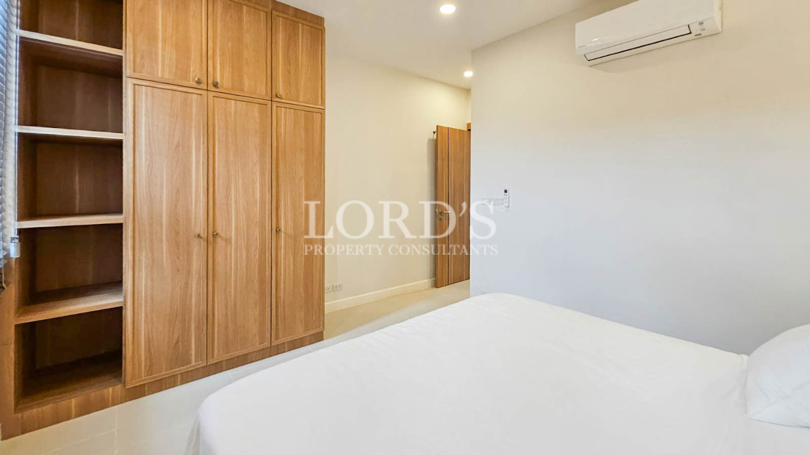 Empty room with wooden wardrobe