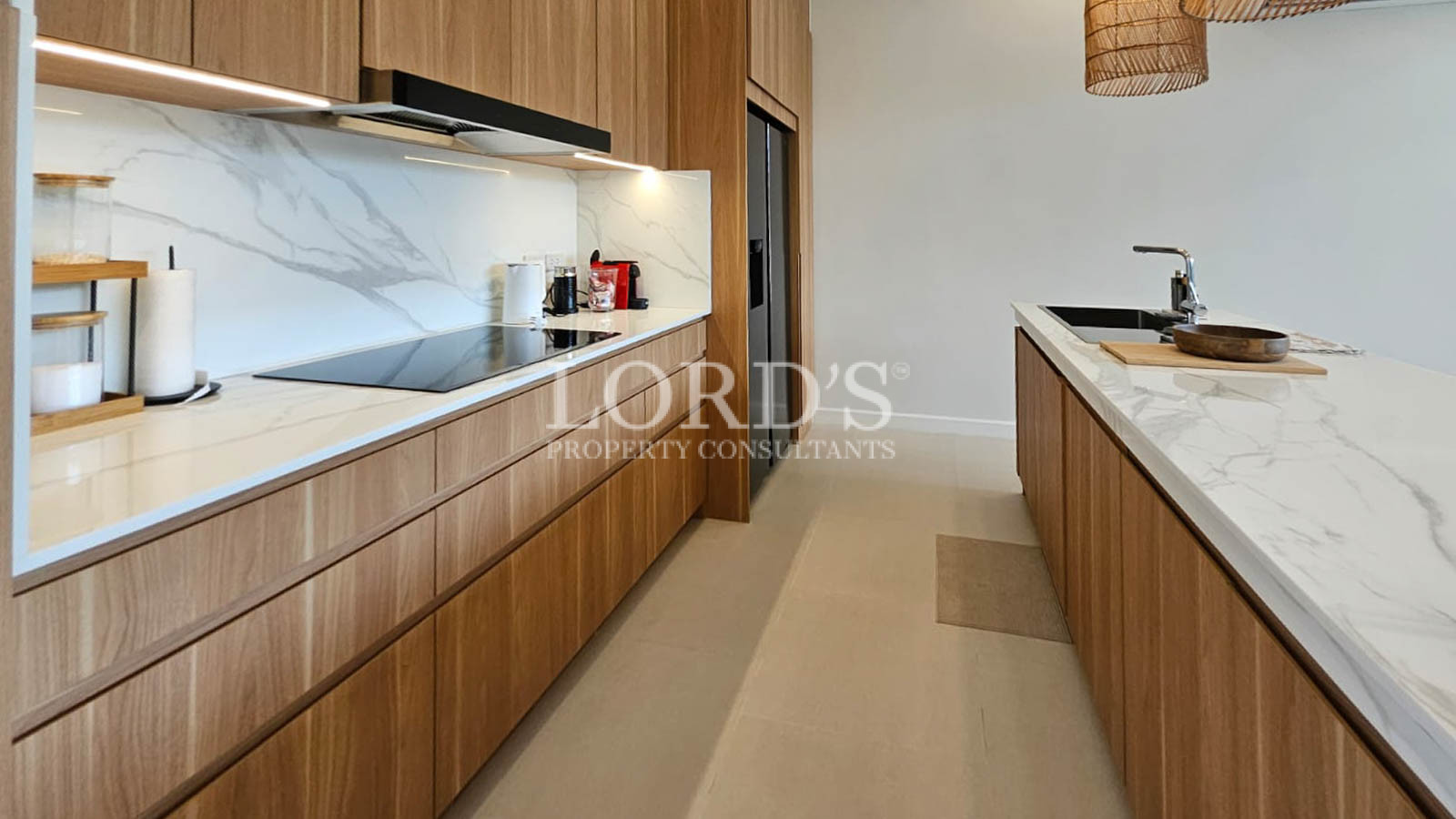 Kitchen with wooden cabinets and appliances