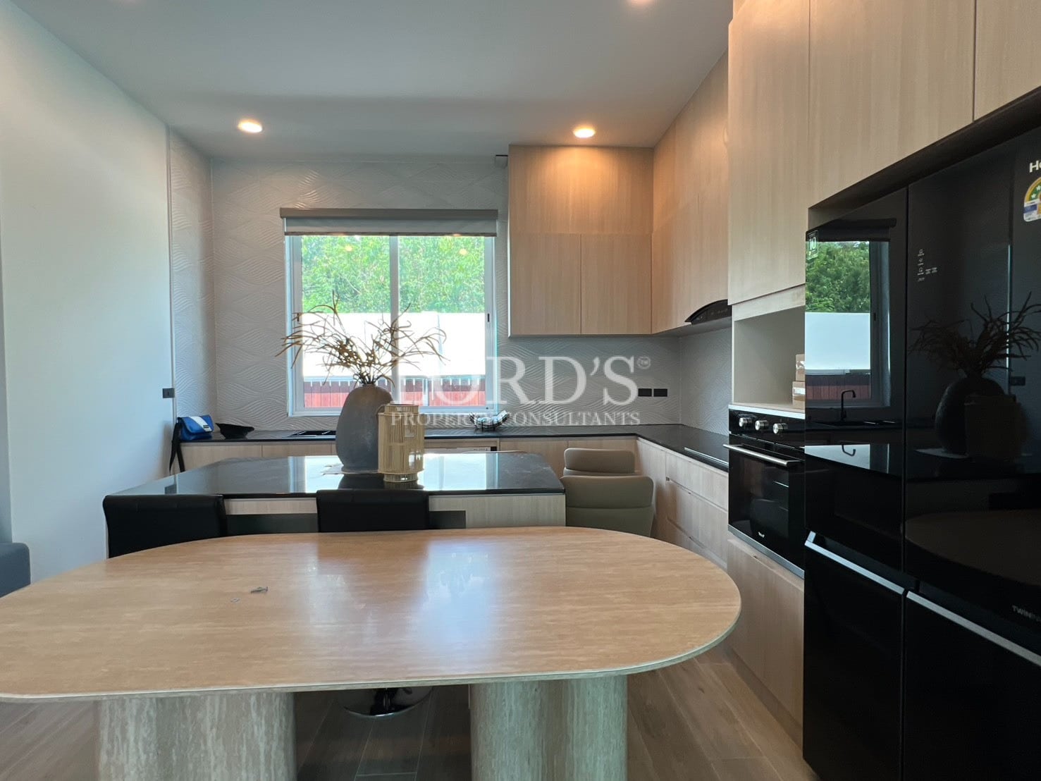 Modern kitchen with island and window view