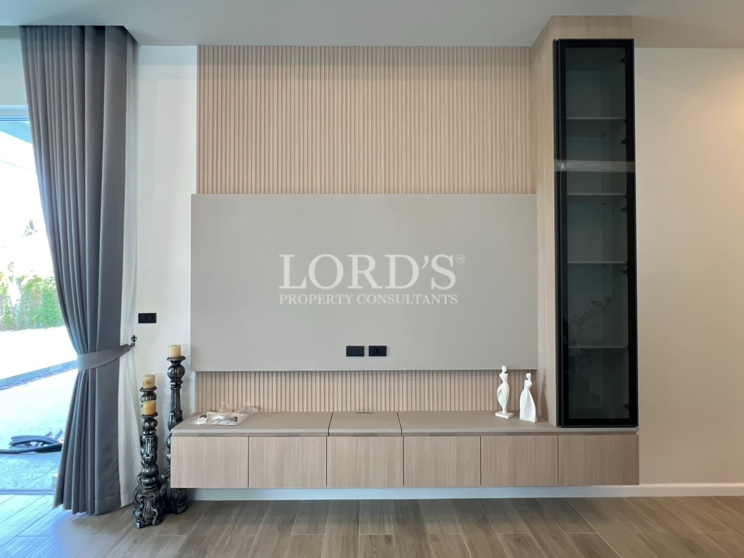 Living room with TV wall and minimalist design