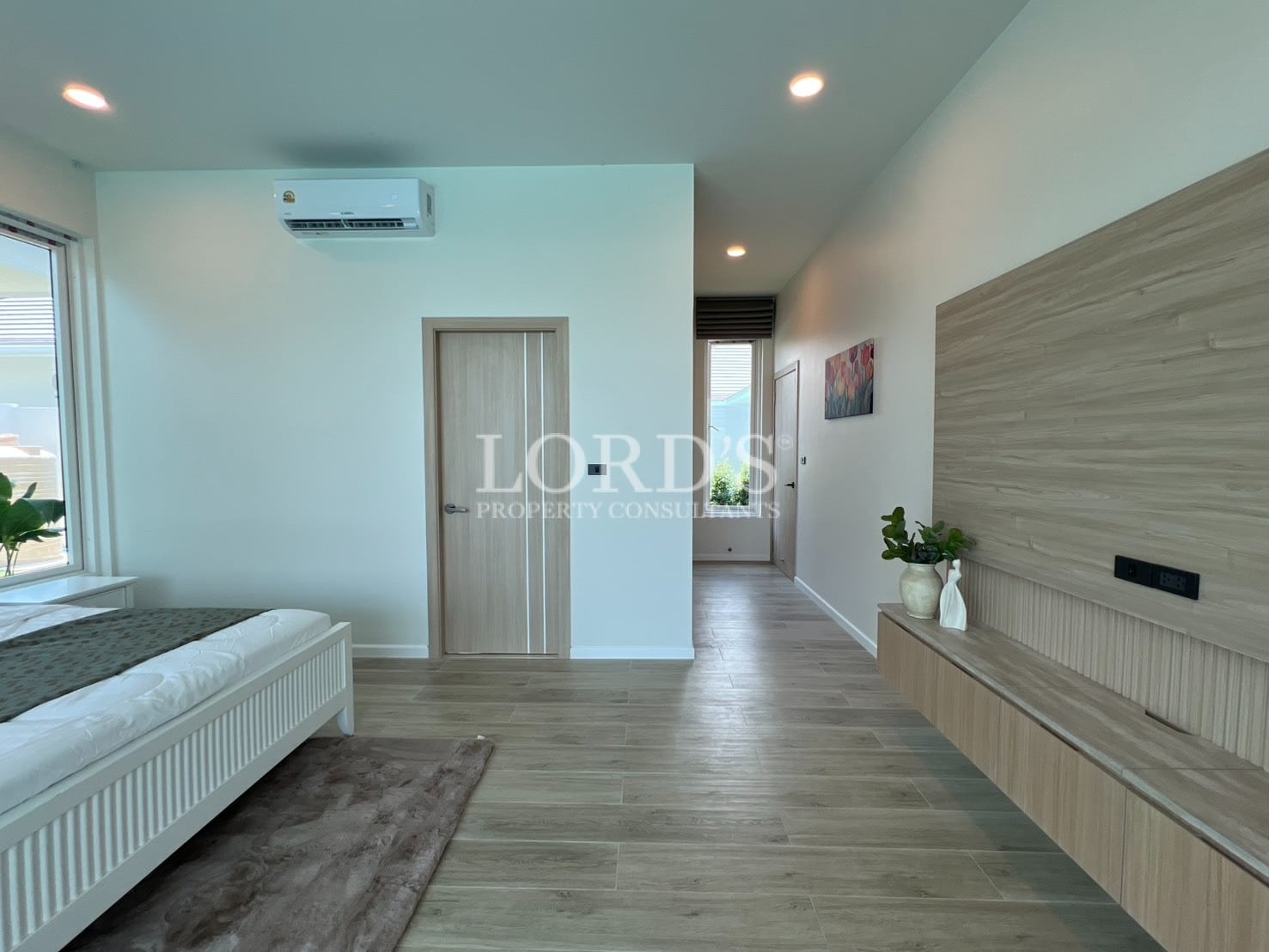 Garden pathway with stepping stones and lawn