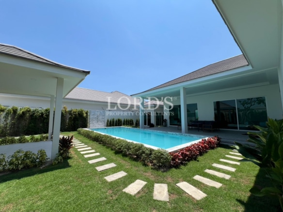 Poolside garden with curved stepping path