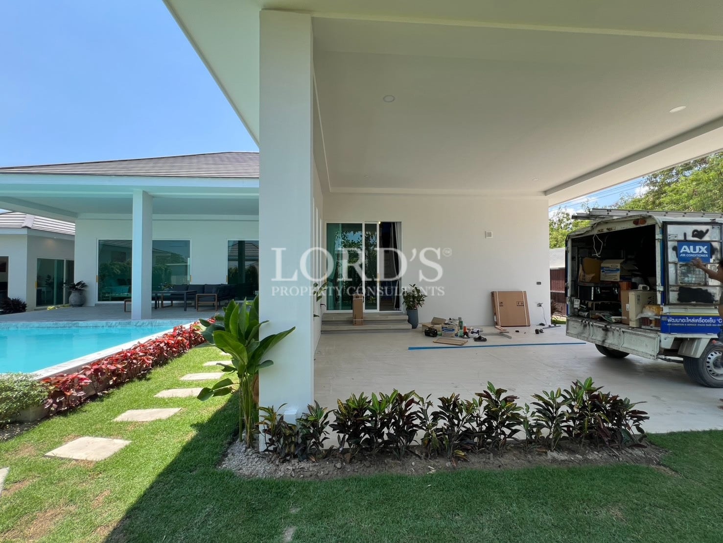 Covered patio with garden and seating