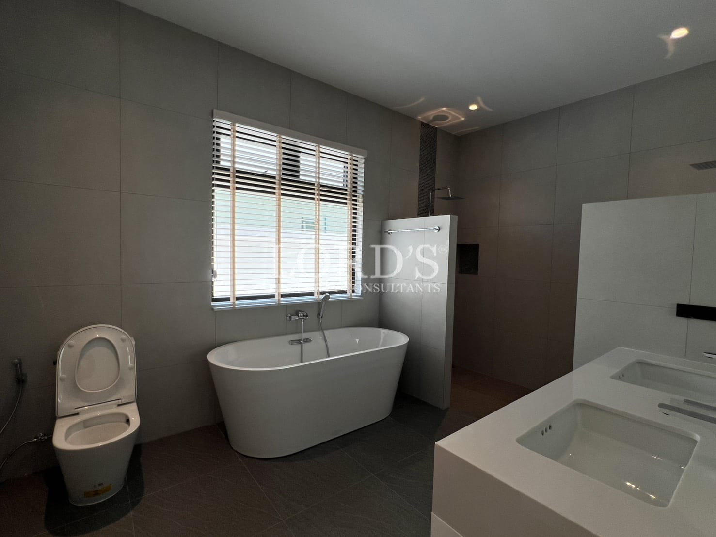 Bathroom with freestanding bathtub