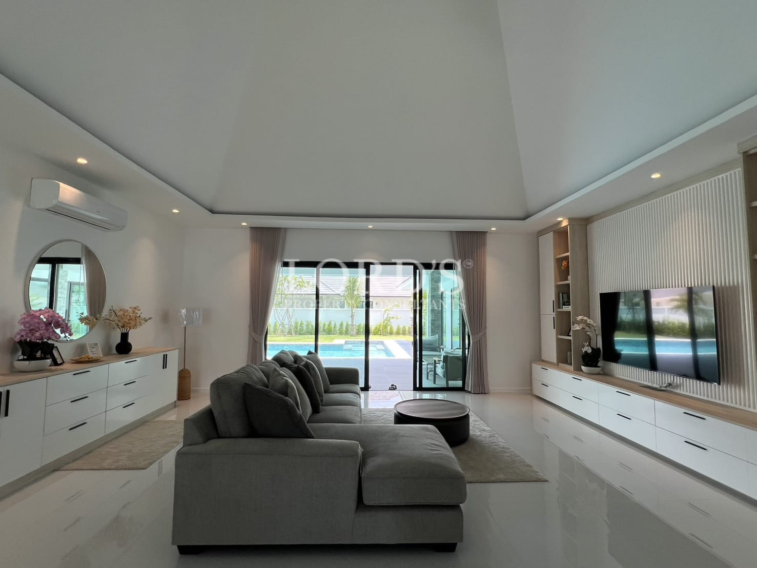 Bright bedroom with large windows